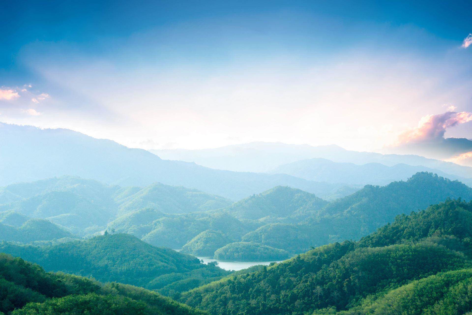 scenic view overlooking mountains and forests